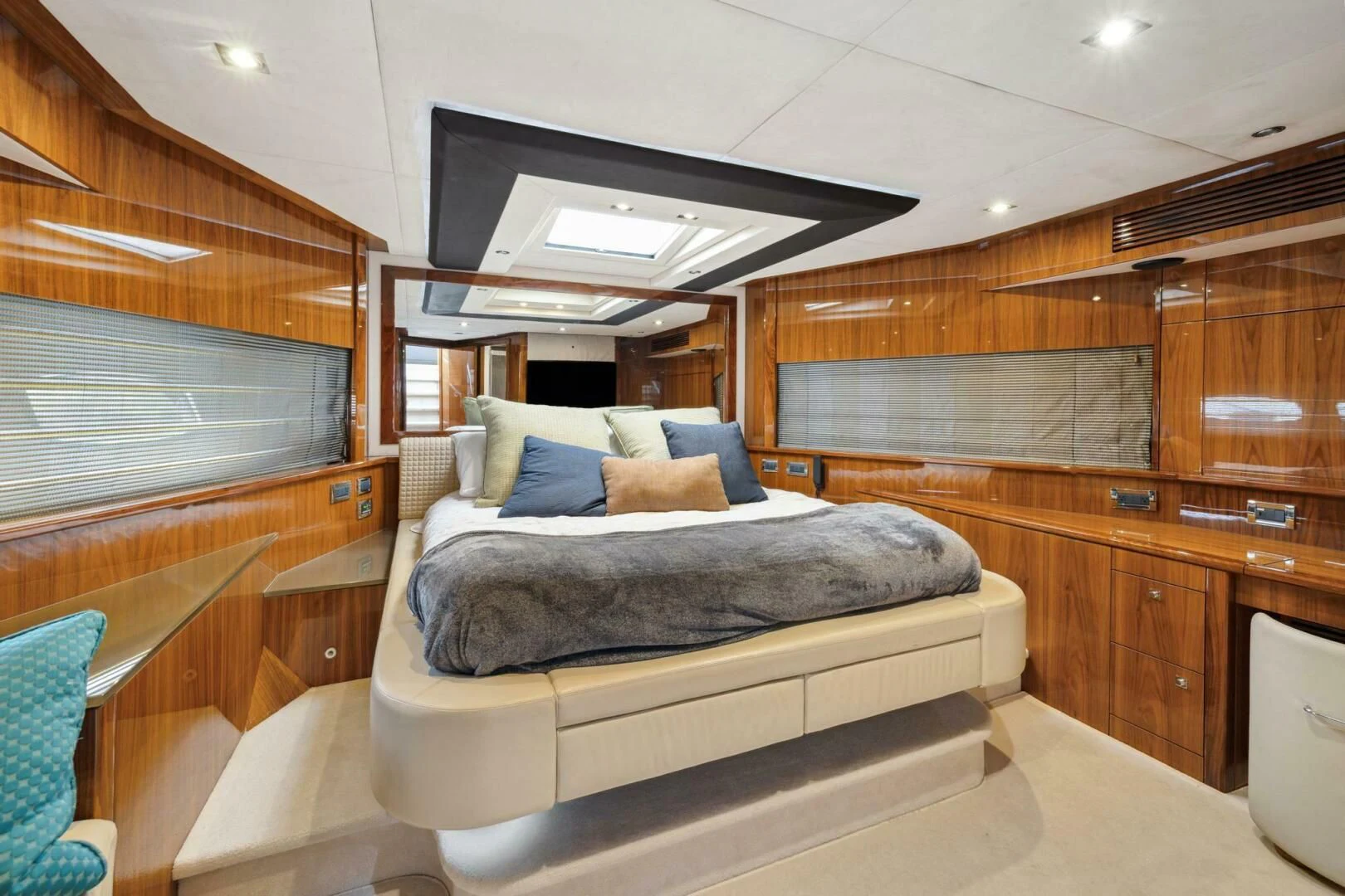 a room with a bed and a television aboard THE CABANA Yacht for Sale