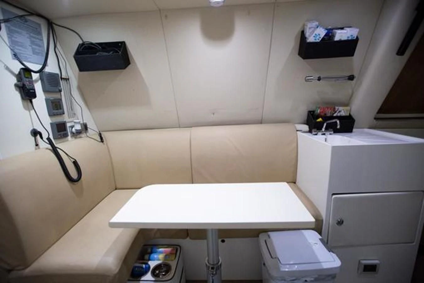 a white table with a white table aboard THE CABANA Yacht for Sale
