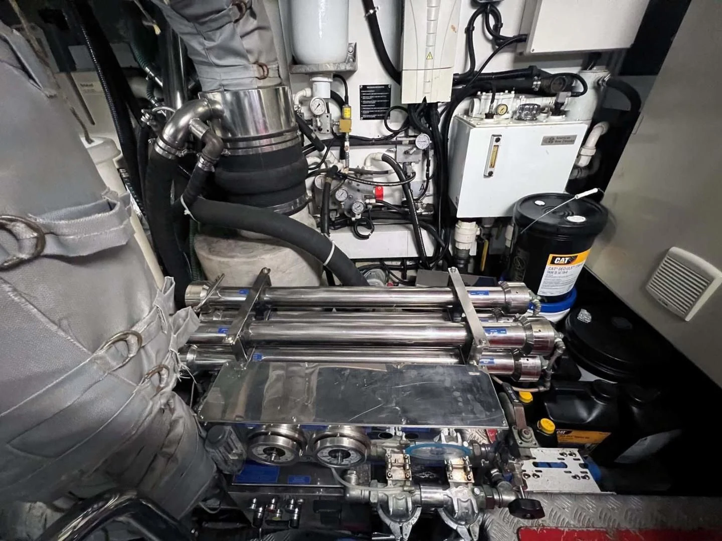 a car engine with a hood open aboard THE CABANA Yacht for Sale