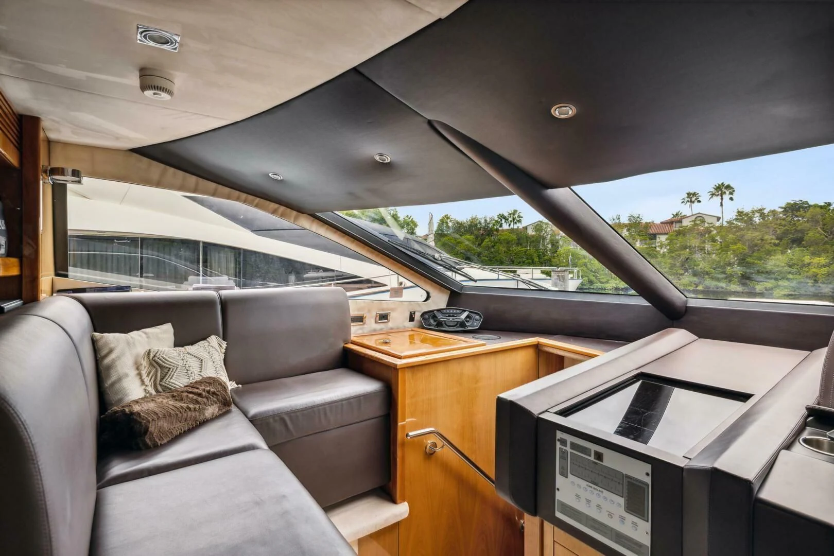 a car with a desk and a bed aboard THE CABANA Yacht for Sale