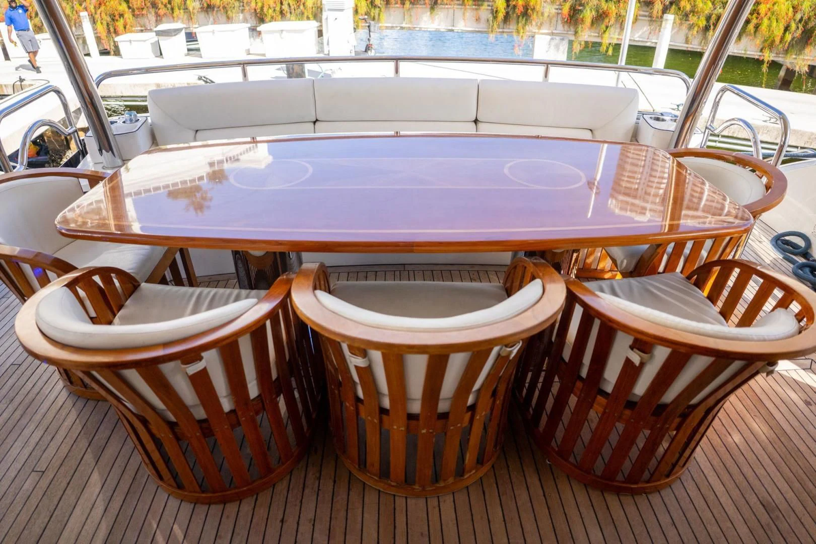 a table with chairs around it aboard THE CABANA Yacht for Sale