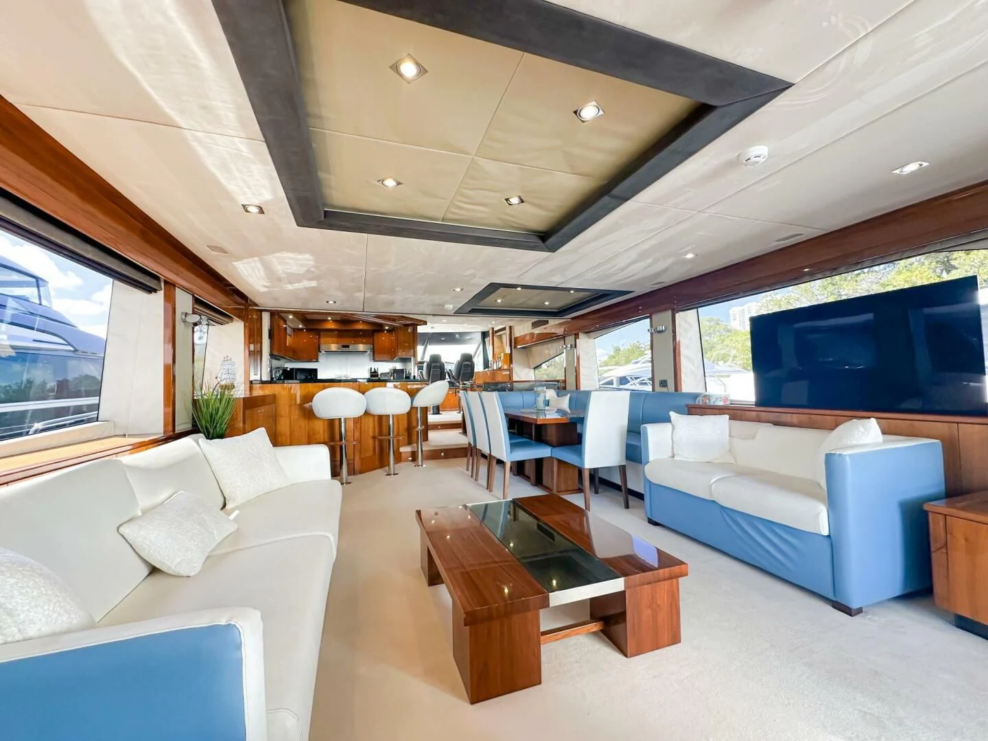 a room with a couch and a table and chairs aboard THE CABANA Yacht for Sale
