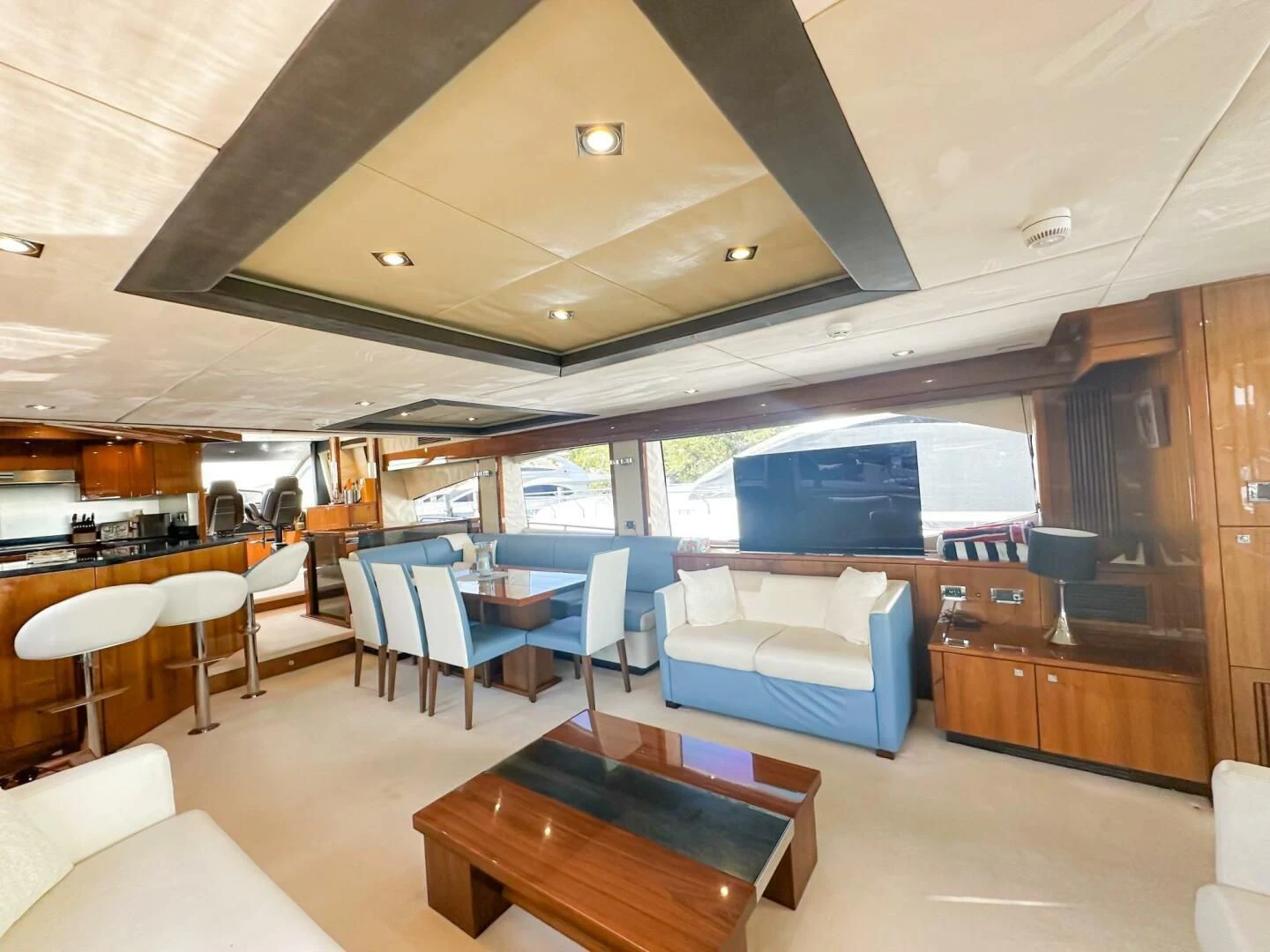 a room with a couch and a table and chairs aboard THE CABANA Yacht for Sale