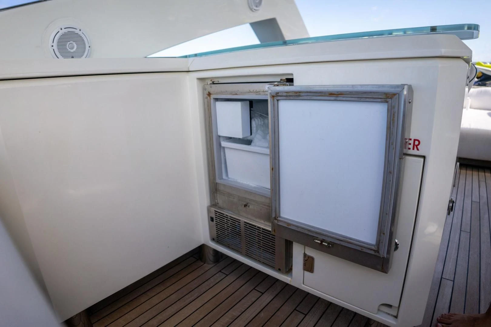a large television on a trailer aboard THE CABANA Yacht for Sale