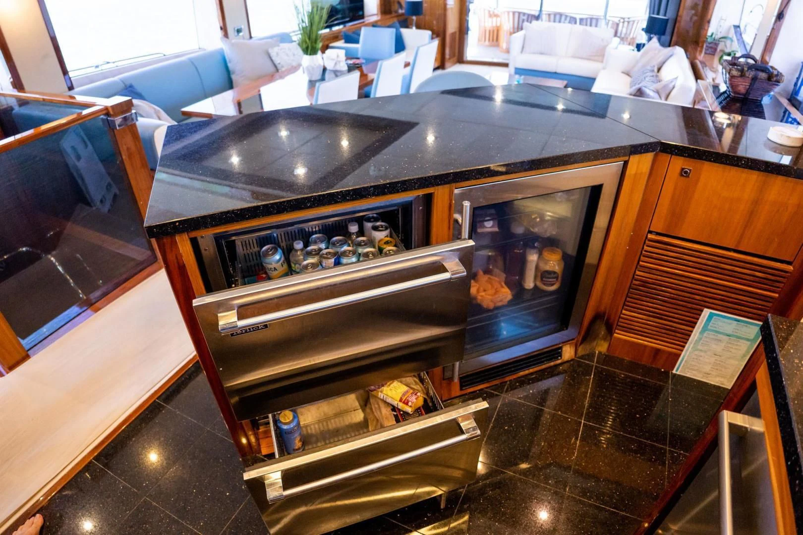 a kitchen with a stove and a sink aboard THE CABANA Yacht for Sale
