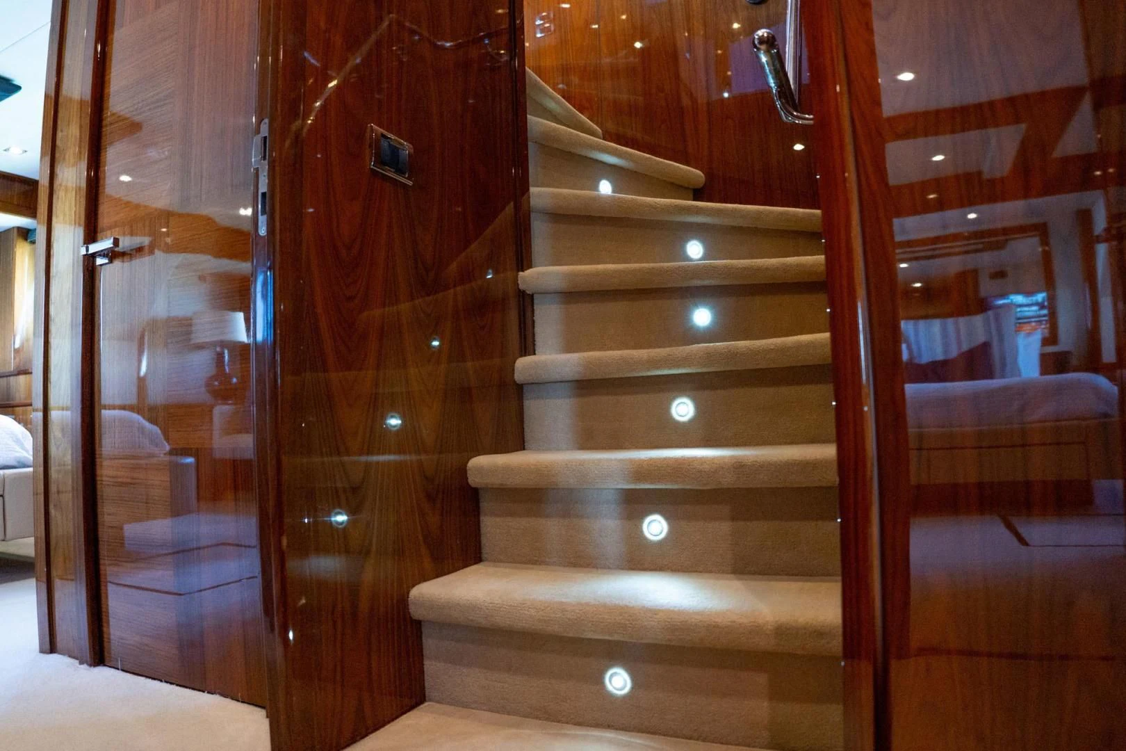 a wooden staircase in a room aboard THE CABANA Yacht for Sale