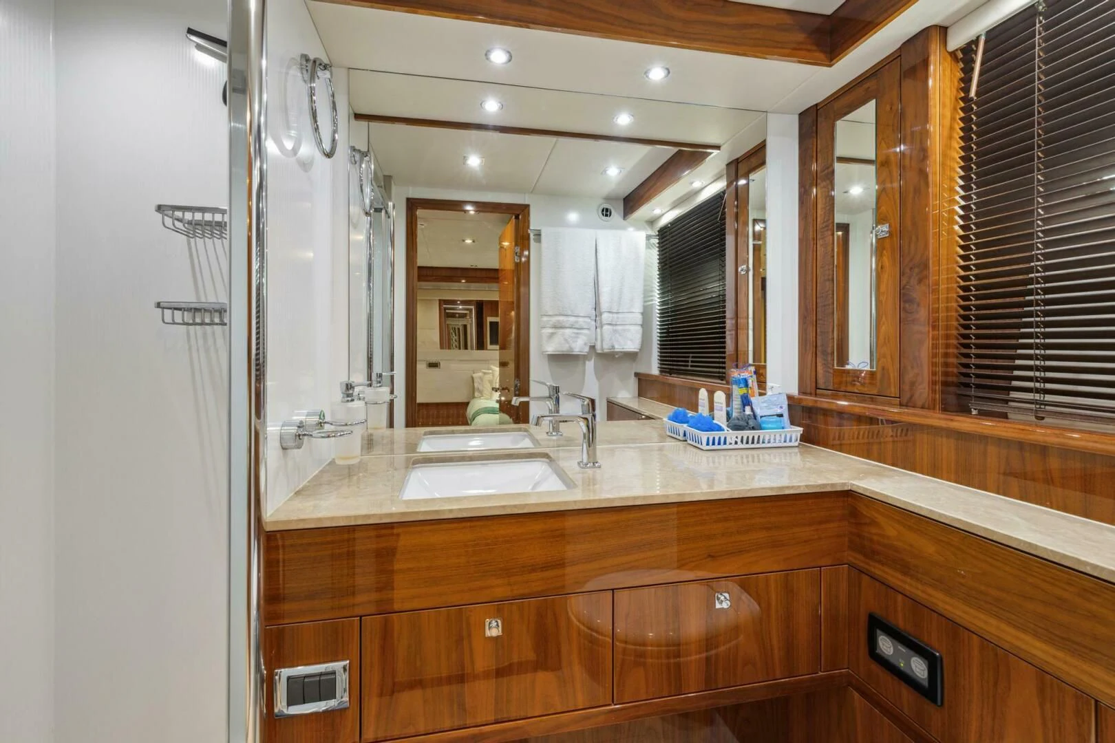 a bathroom with a large mirror aboard THE CABANA Yacht for Sale