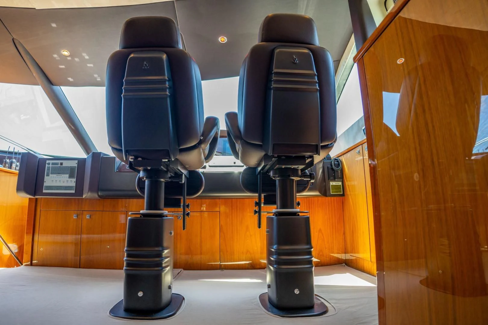 a black chair in a room aboard THE CABANA Yacht for Sale