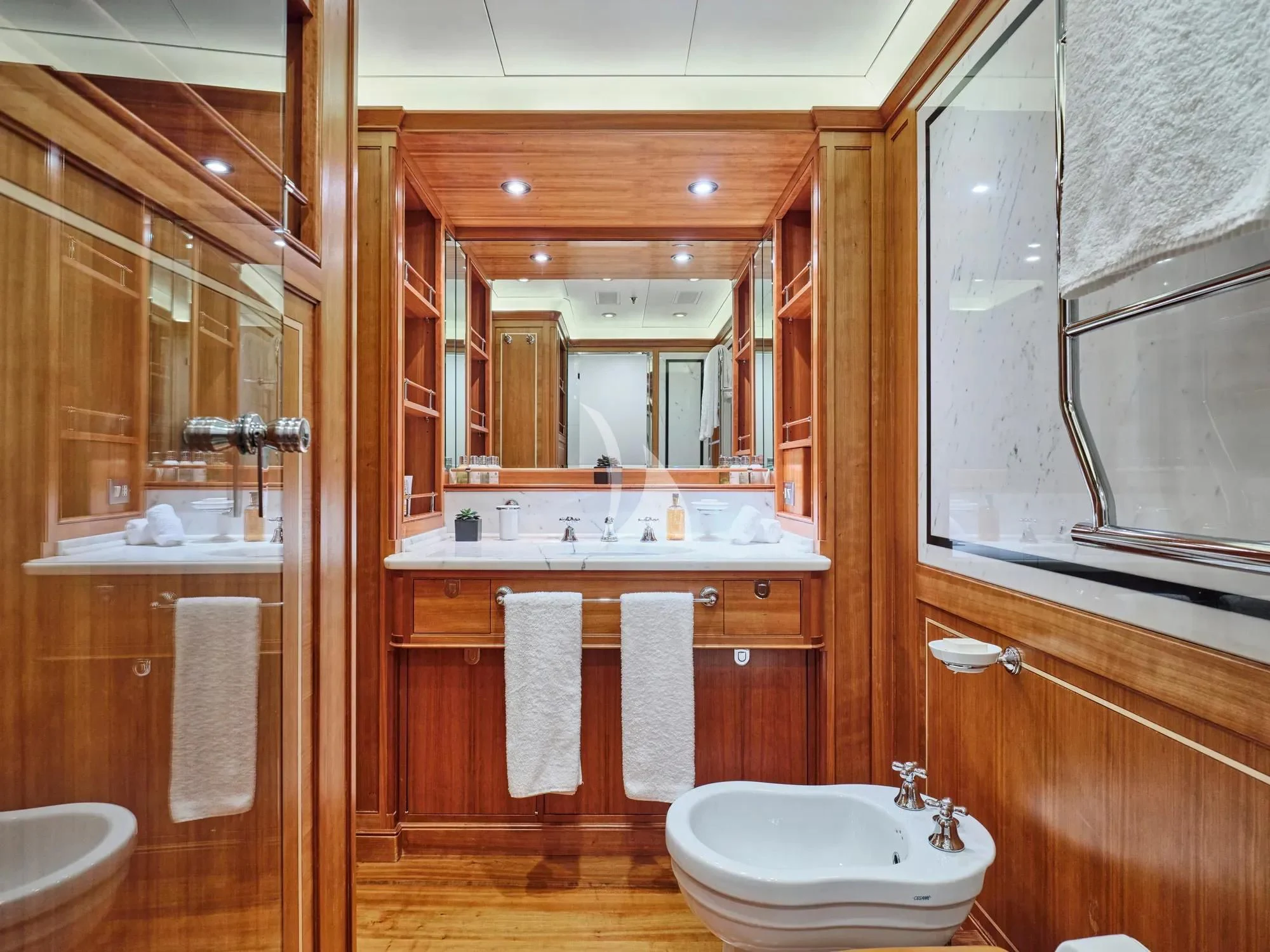 a bathroom with a large mirror aboard BURRASCA Yacht for Sale