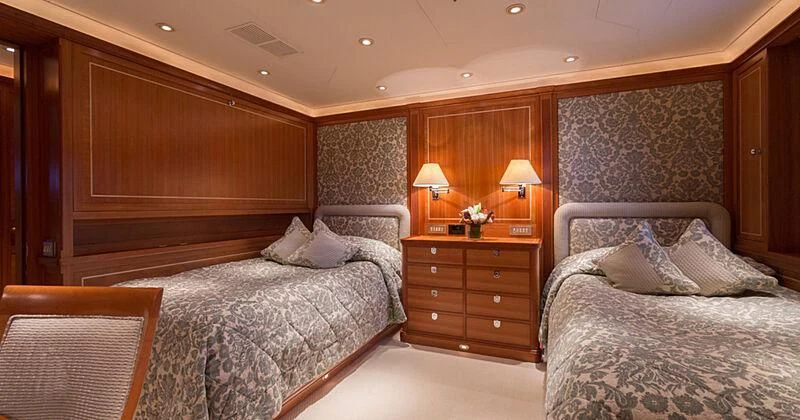 a room with two beds aboard BURRASCA Yacht for Sale