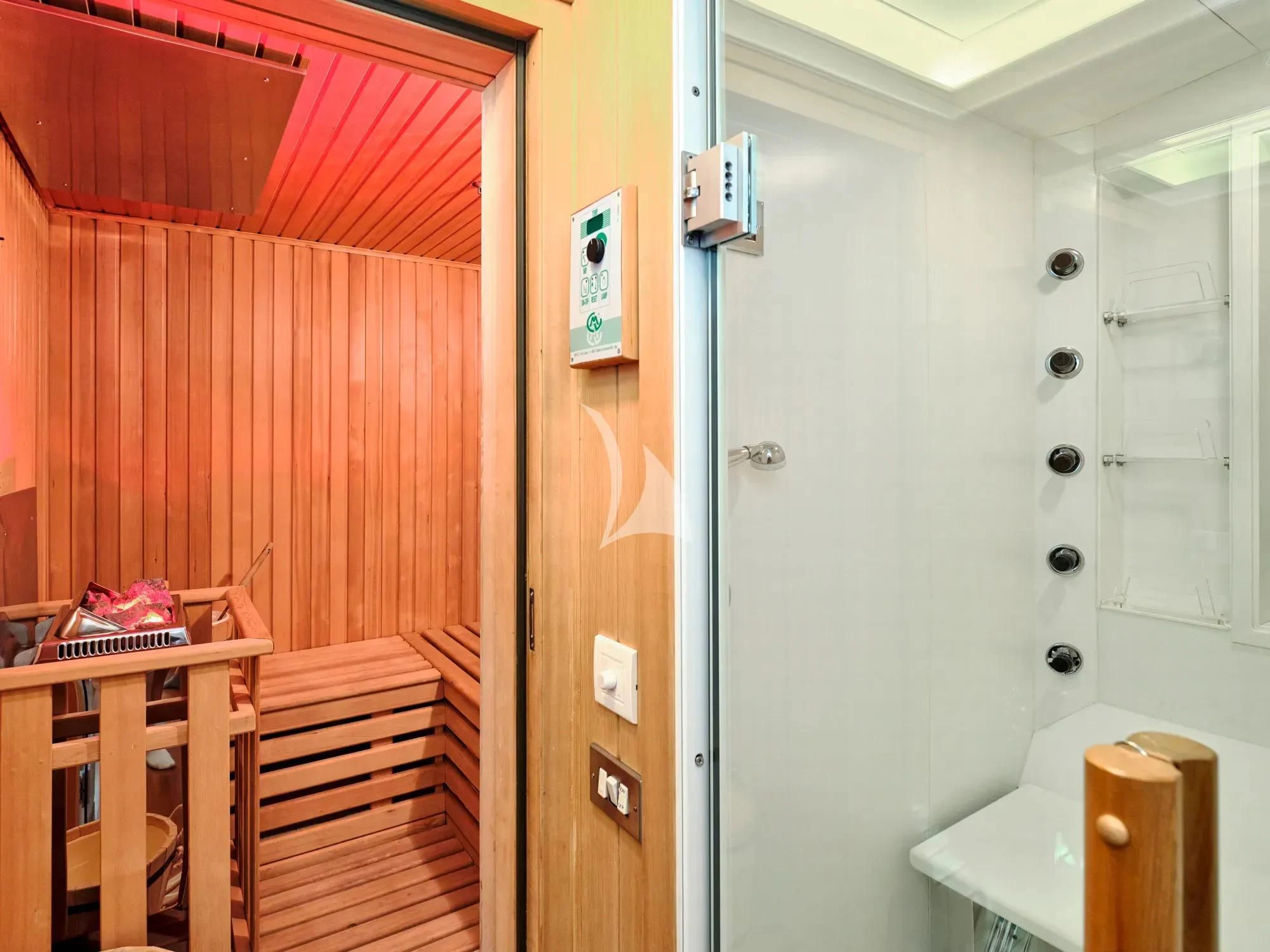 a bathroom with red walls aboard BURRASCA Yacht for Sale