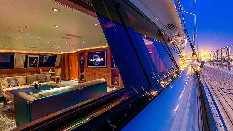 a pool with a couch and a television on the side aboard BURRASCA Yacht for Sale
