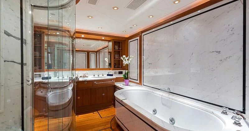 a large bathroom with a large bathtub aboard BURRASCA Yacht for Sale