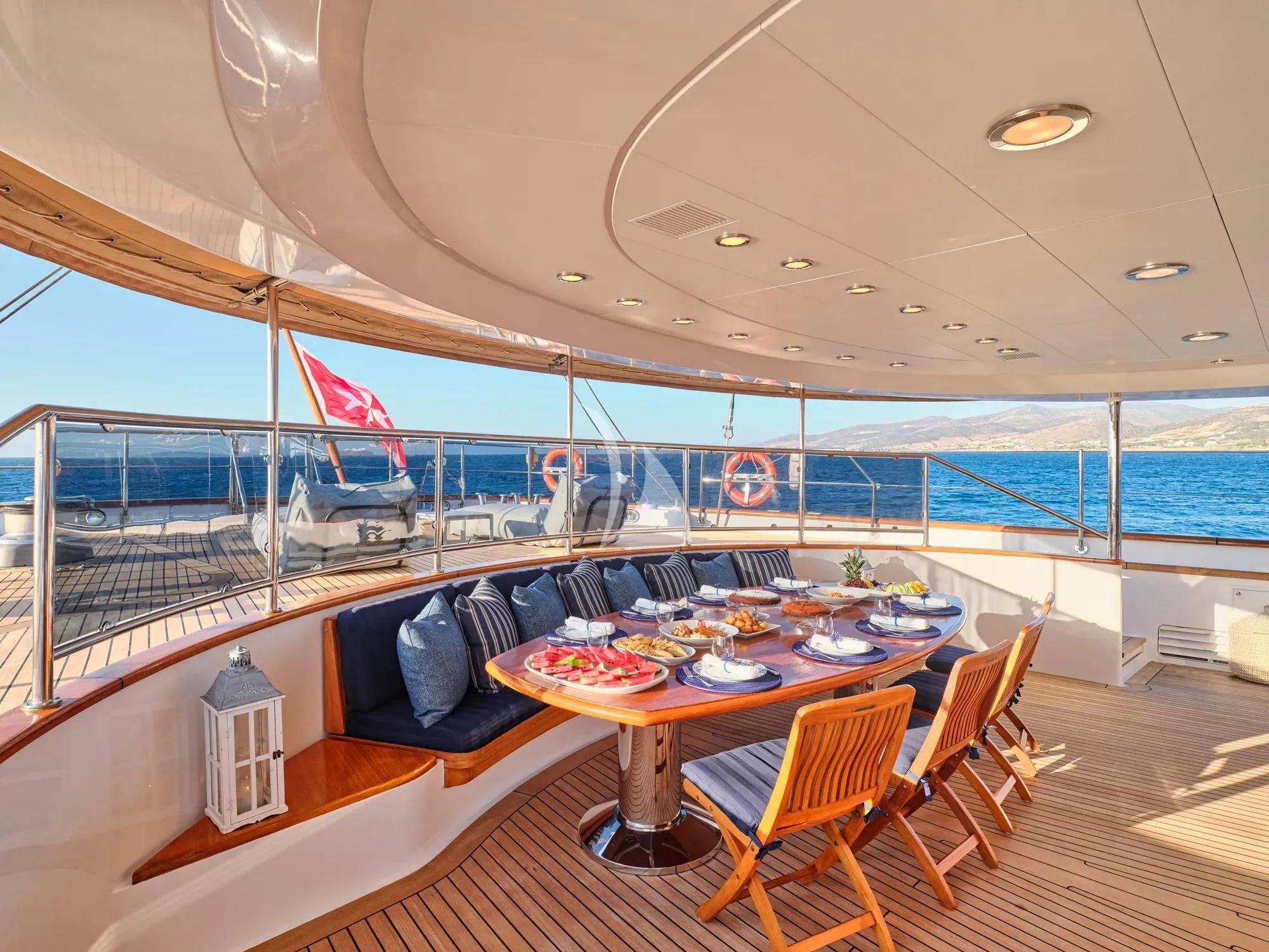 a dining table on a boat aboard BURRASCA Yacht for Sale