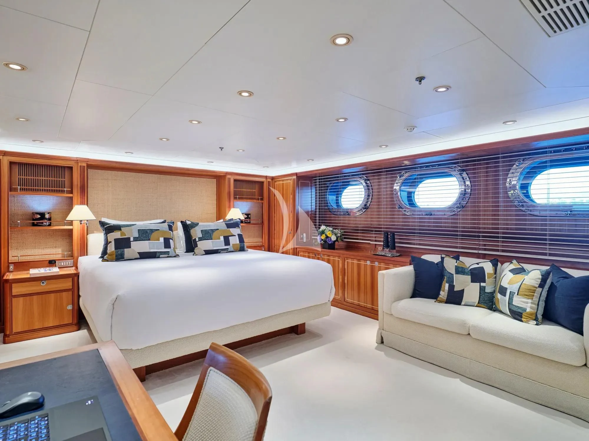 a room with a bed and a desk aboard BURRASCA Yacht for Sale