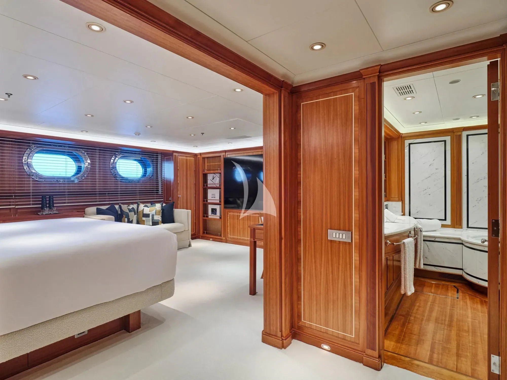 a room with a bed and a television aboard BURRASCA Yacht for Sale
