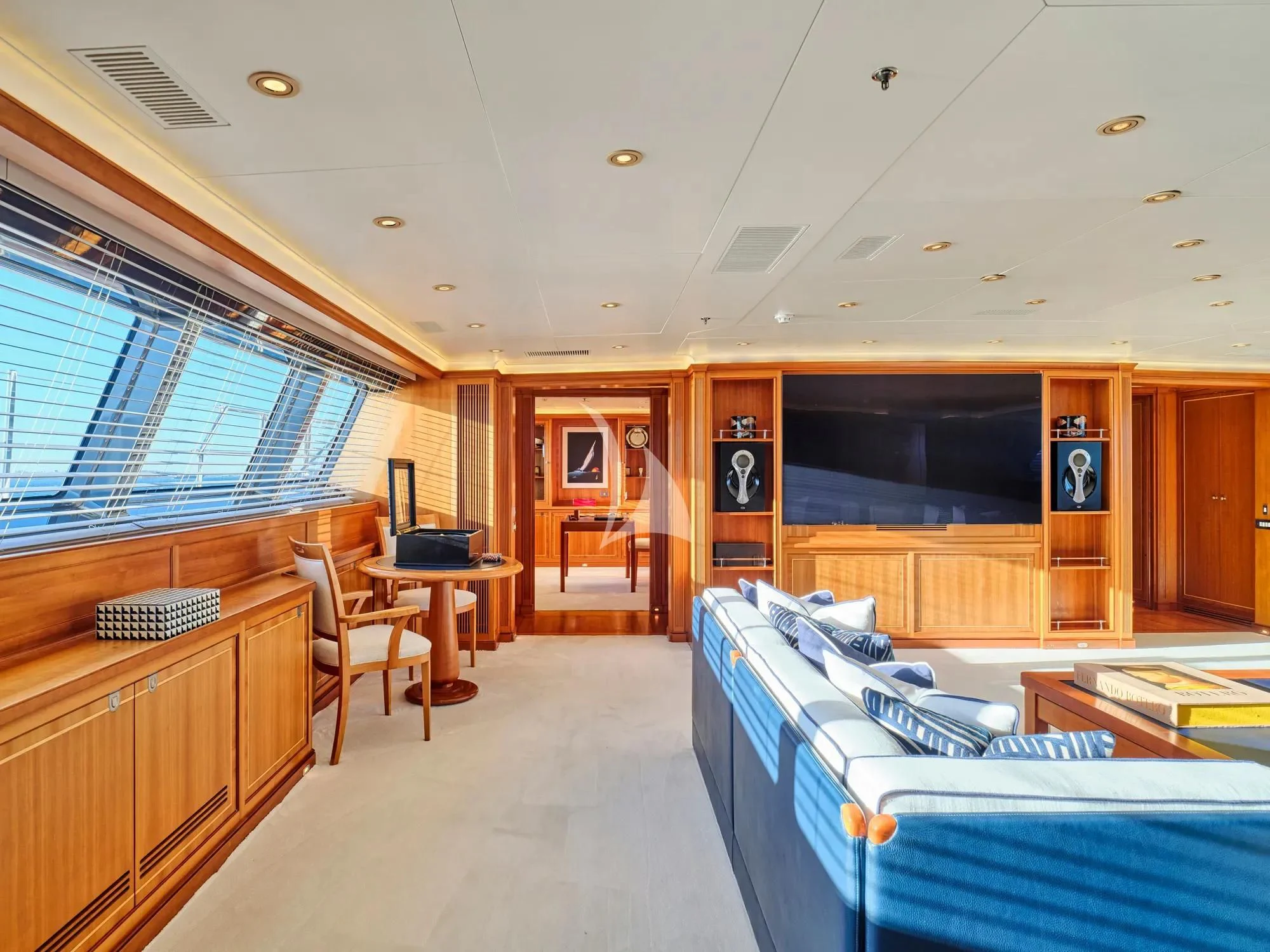 a room with a bed and a tv aboard BURRASCA Yacht for Sale