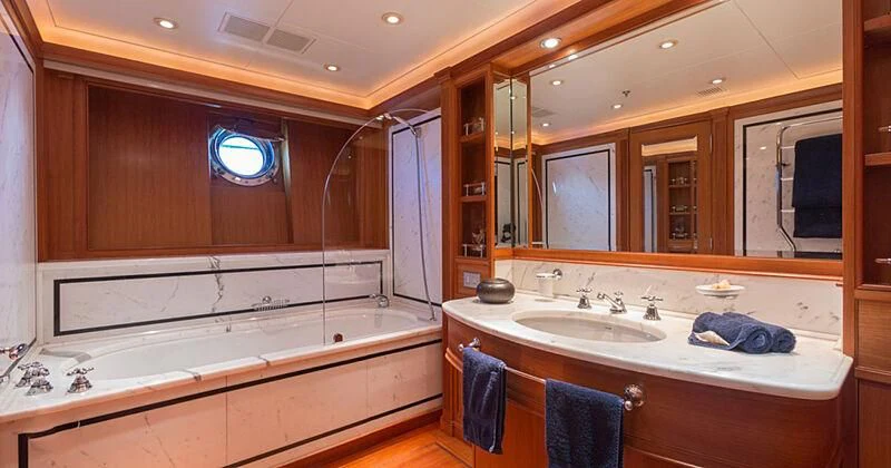 a bathroom with a large mirror aboard BURRASCA Yacht for Sale