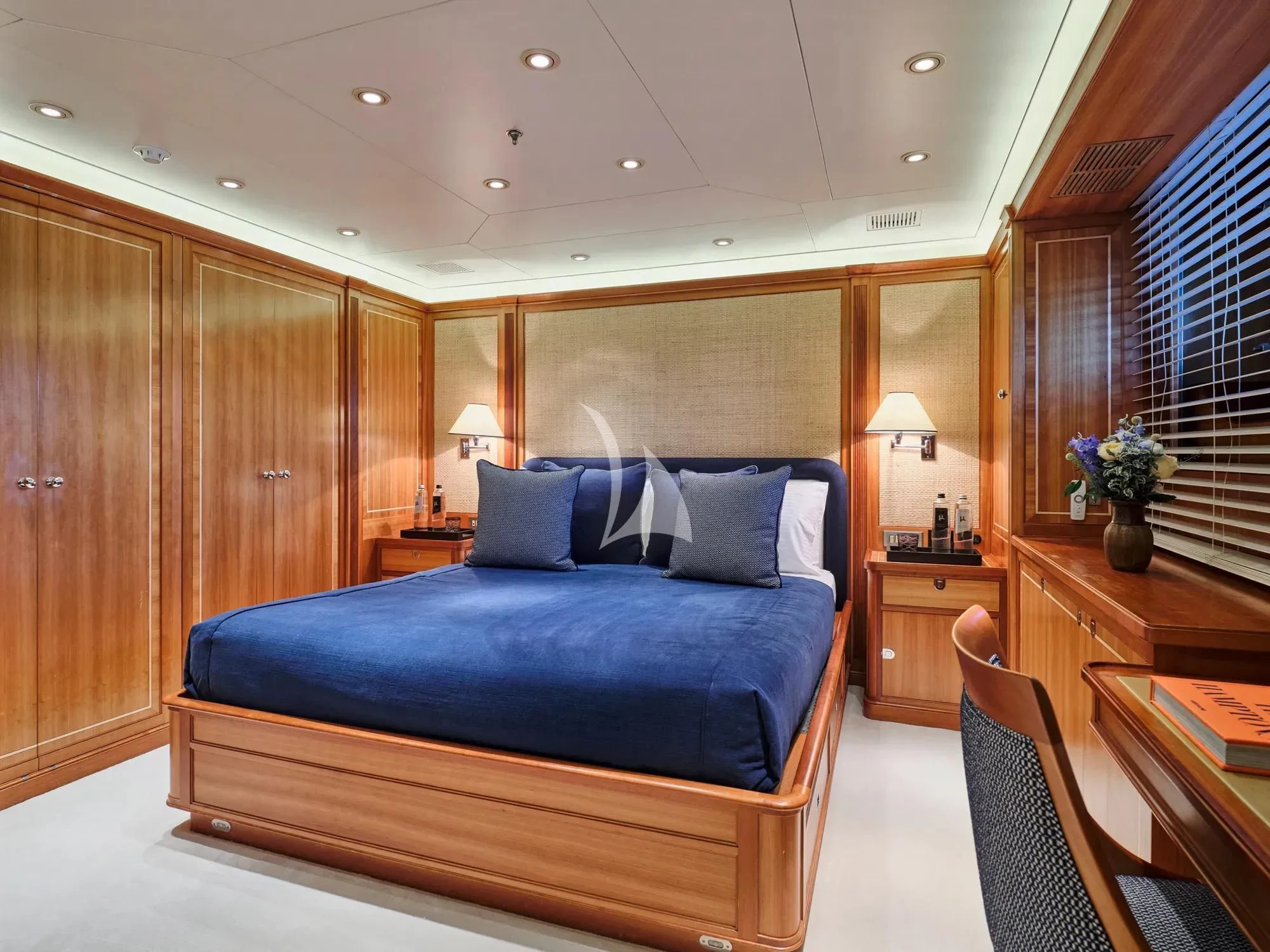 a bed in a room aboard BURRASCA Yacht for Sale