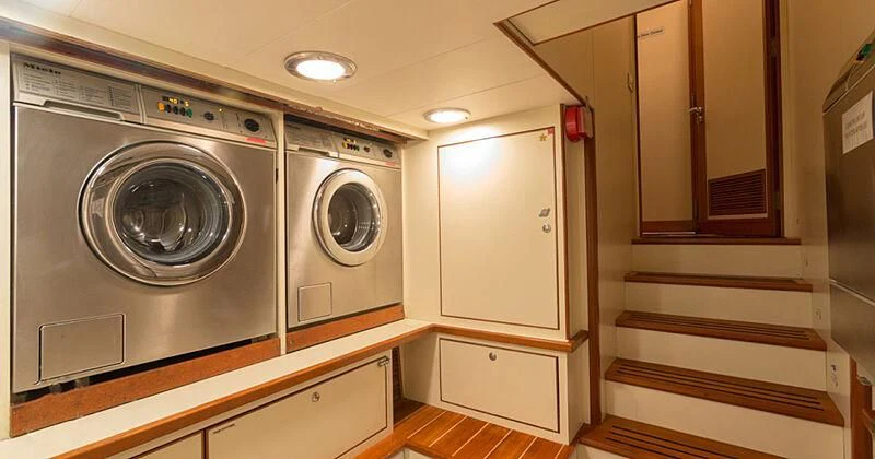 a room with a washer and dryer aboard BURRASCA Yacht for Sale