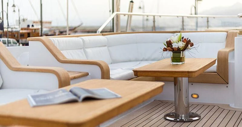 a table with a vase of flowers on it aboard BURRASCA Yacht for Sale