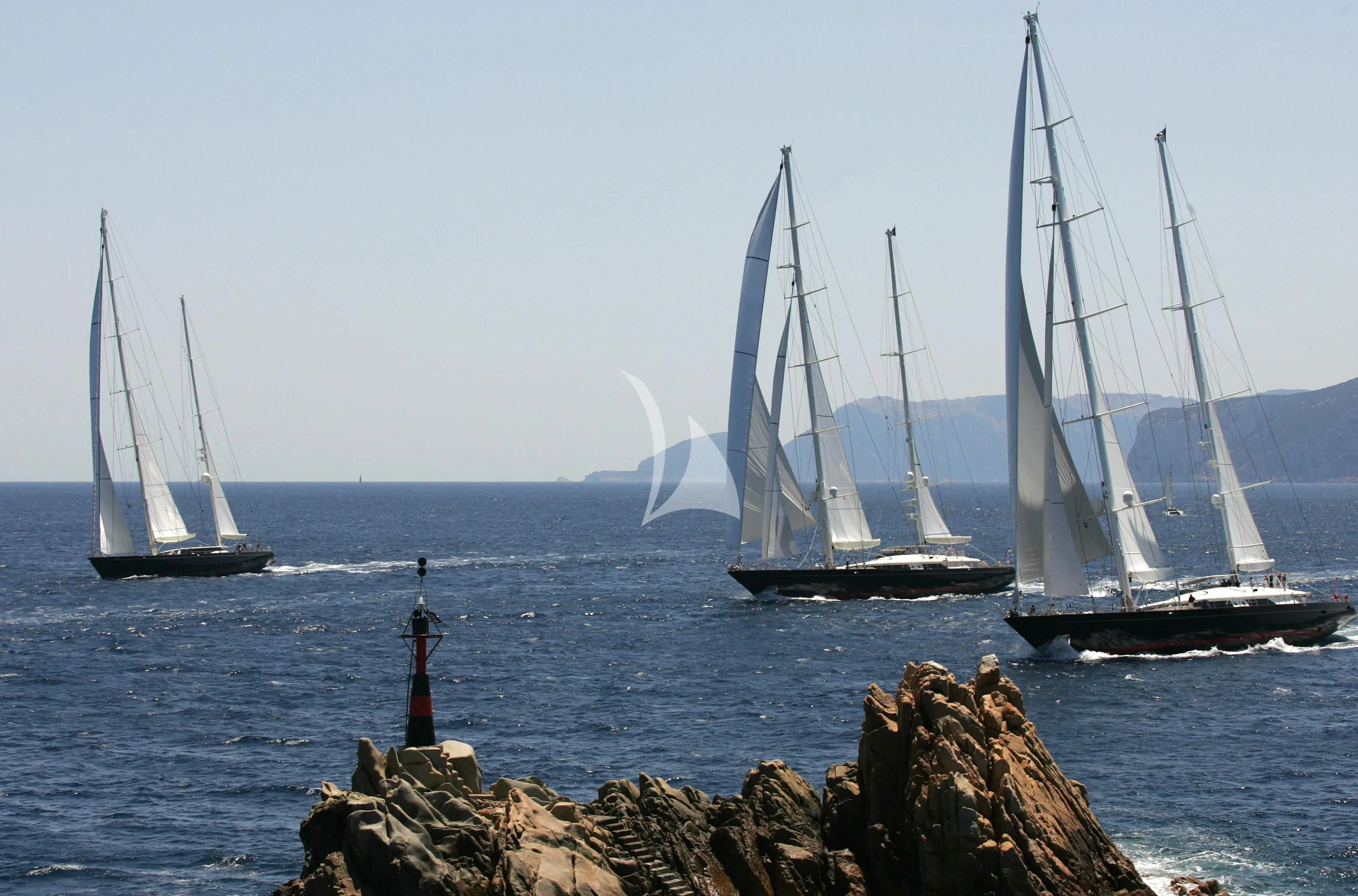 a group of boats on the water aboard BURRASCA Yacht for Sale