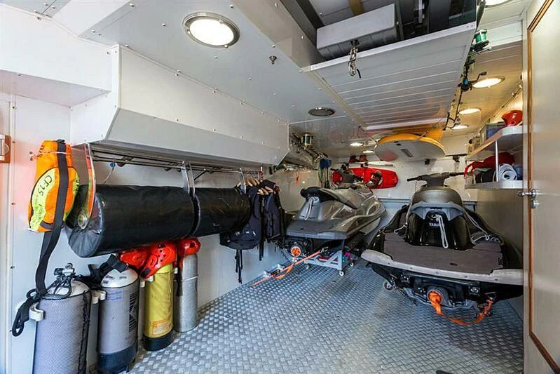 a room with a lot of items in it aboard BURRASCA Yacht for Sale