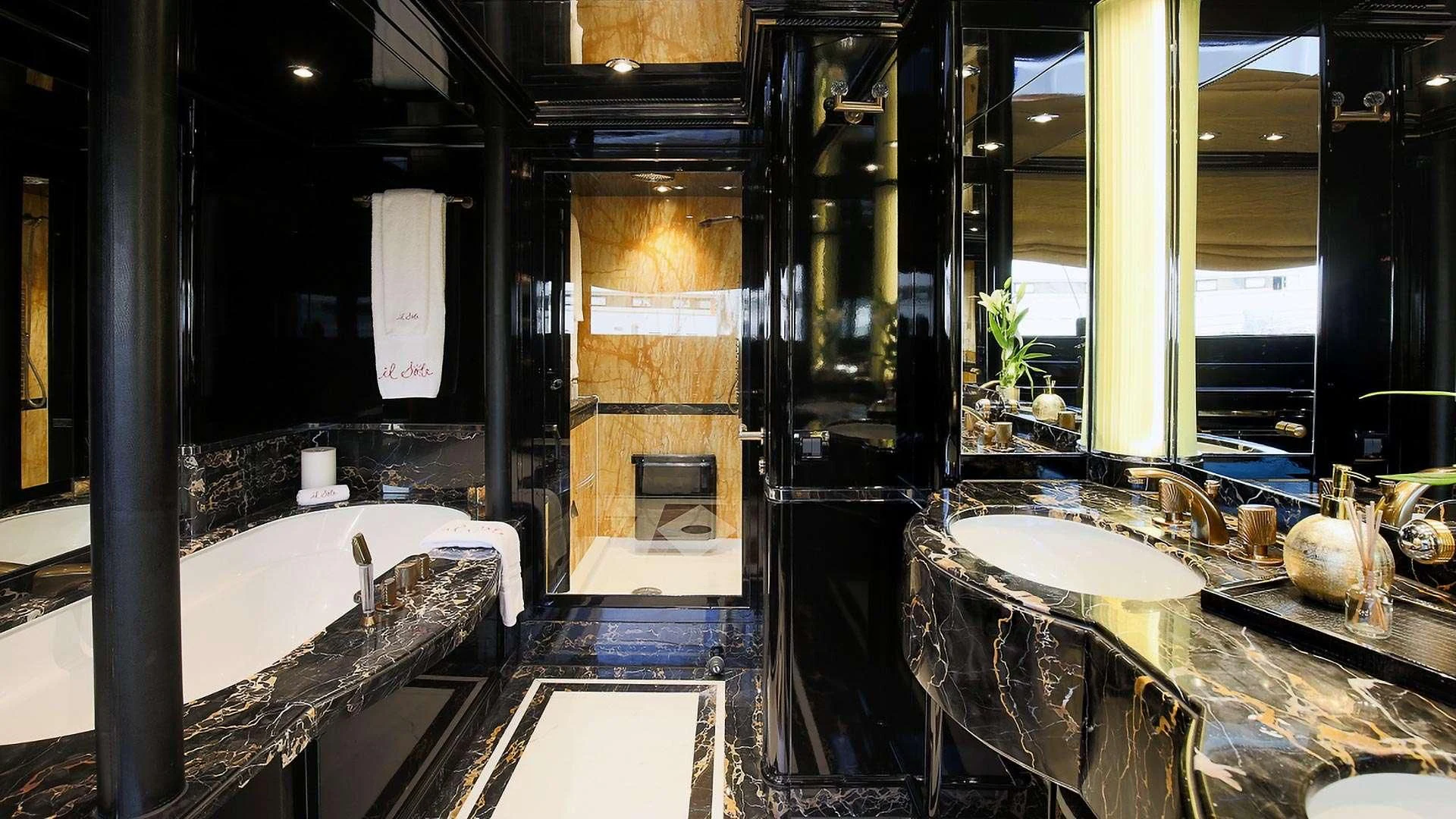 a bathroom with a large tub aboard IL SOLE Yacht for Sale