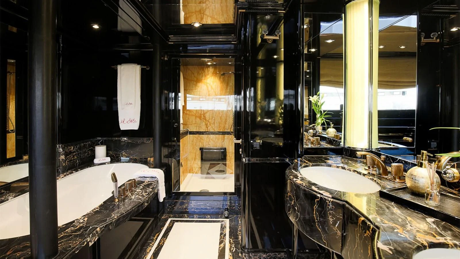 a bathroom with a large tub aboard IL SOLE Yacht for Sale