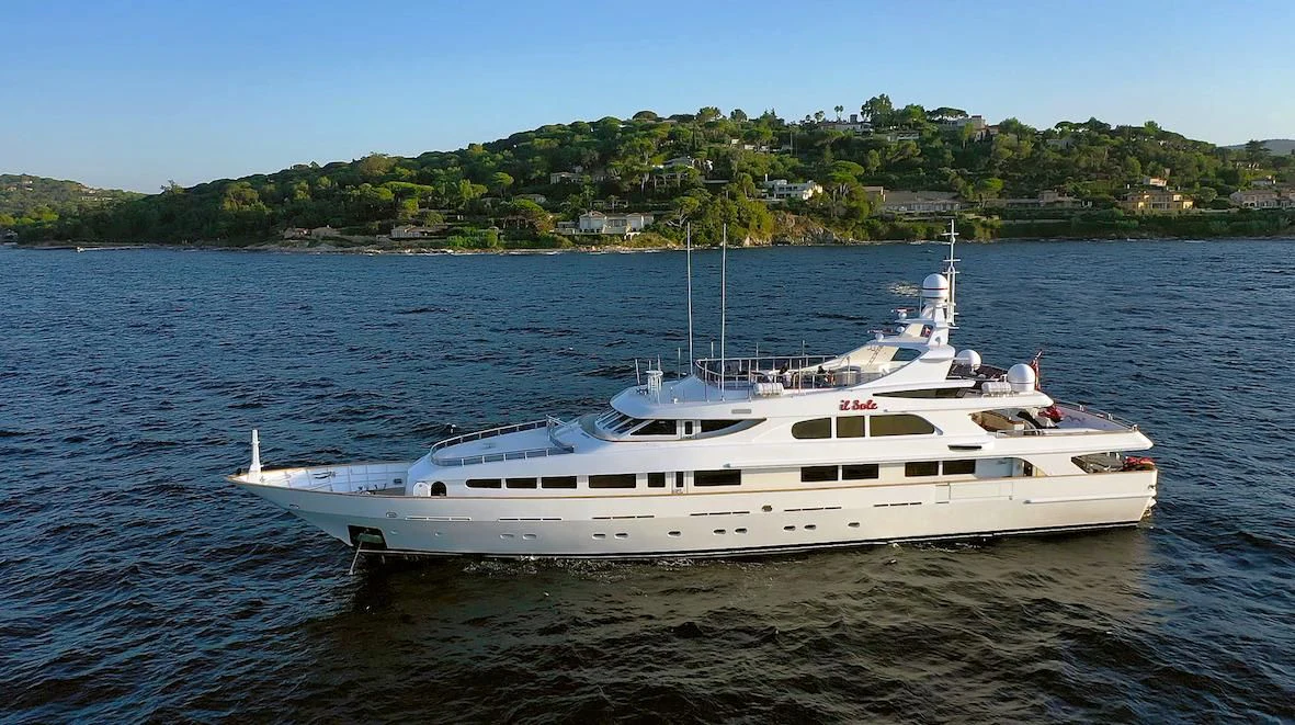a white yacht in the water aboard IL SOLE Yacht for Sale