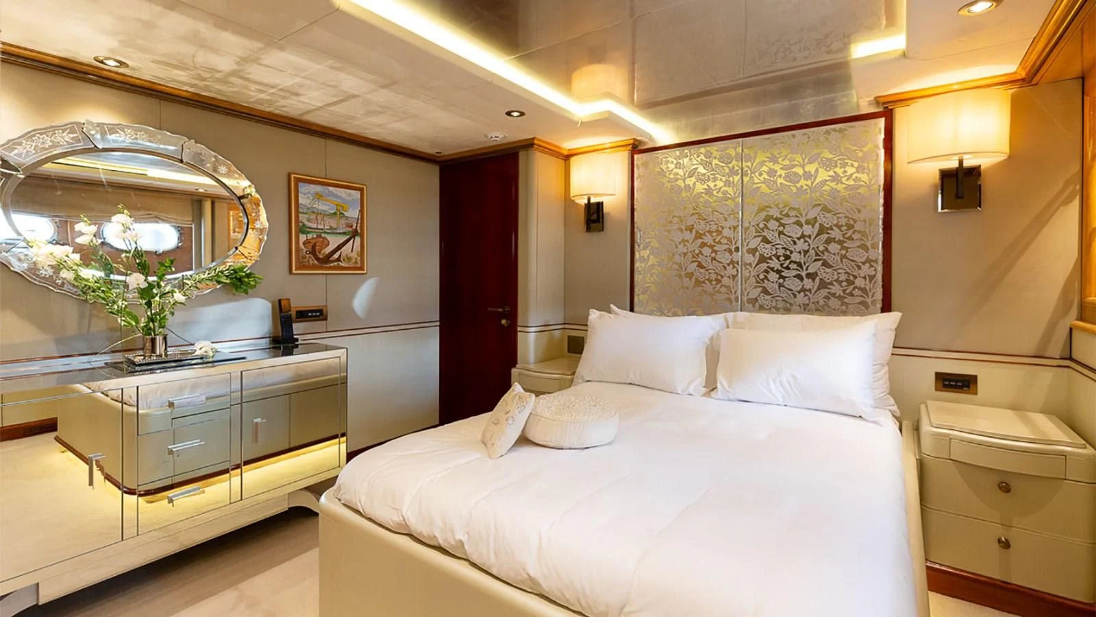 a room with a bed and a mirror aboard IL SOLE Yacht for Sale