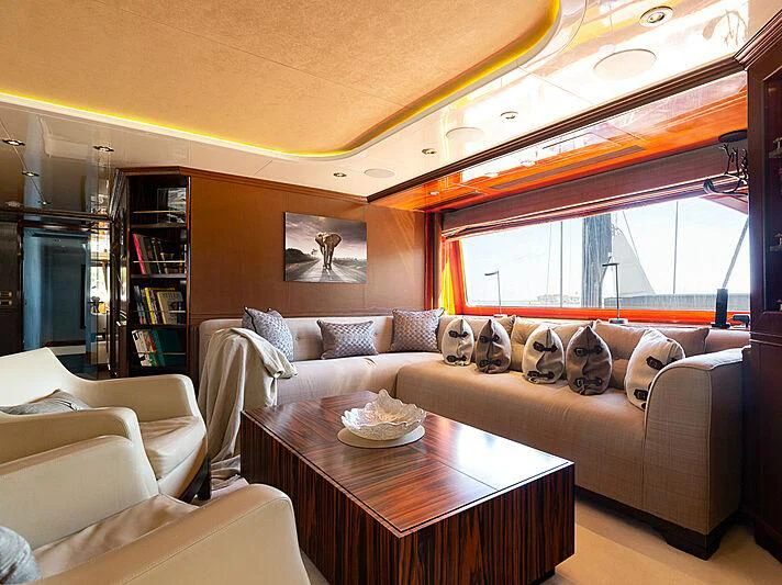 a living room with a large window aboard IL SOLE Yacht for Sale