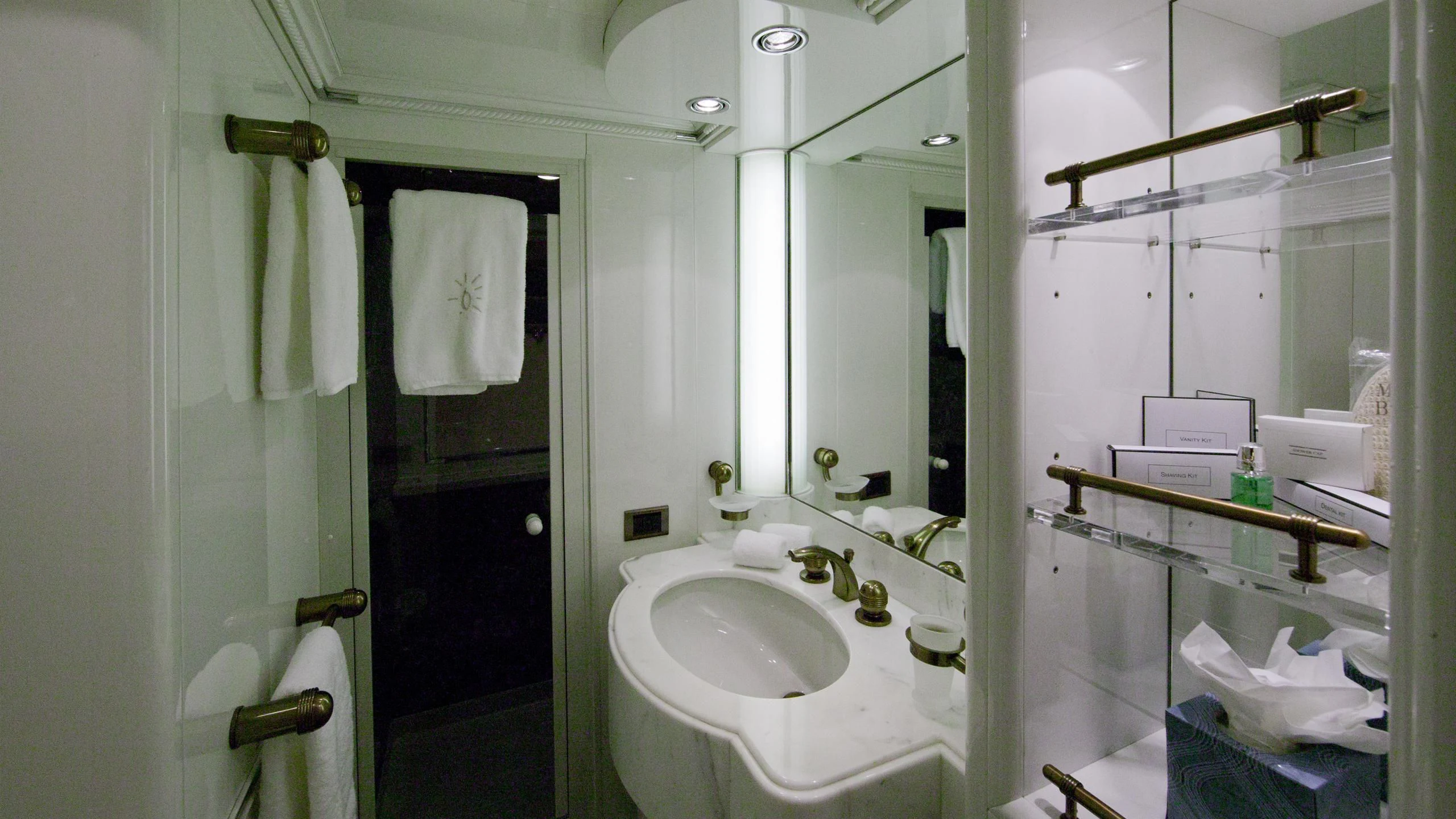 a bathroom with a sink and mirror aboard IL SOLE Yacht for Sale