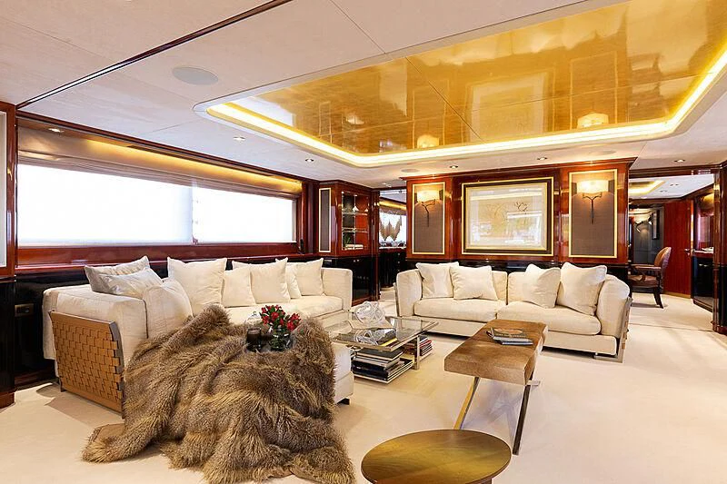 a living room with a large window aboard IL SOLE Yacht for Sale