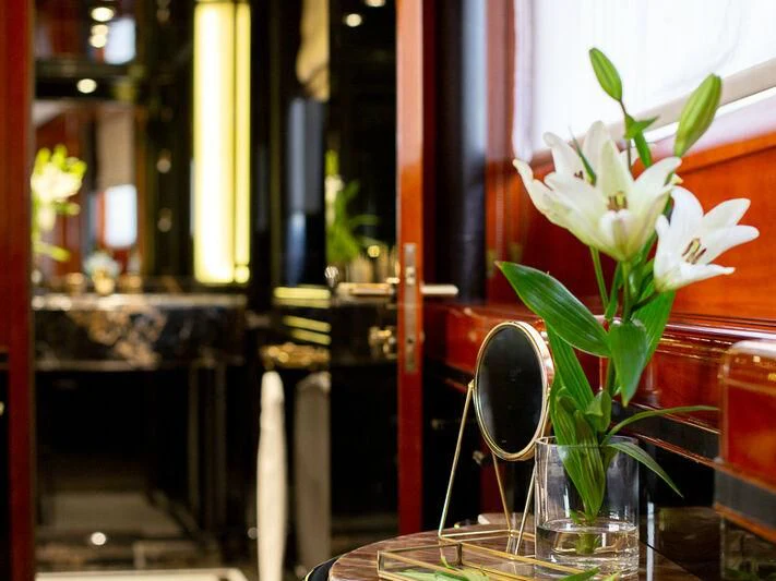 a vase with white flowers aboard IL SOLE Yacht for Sale