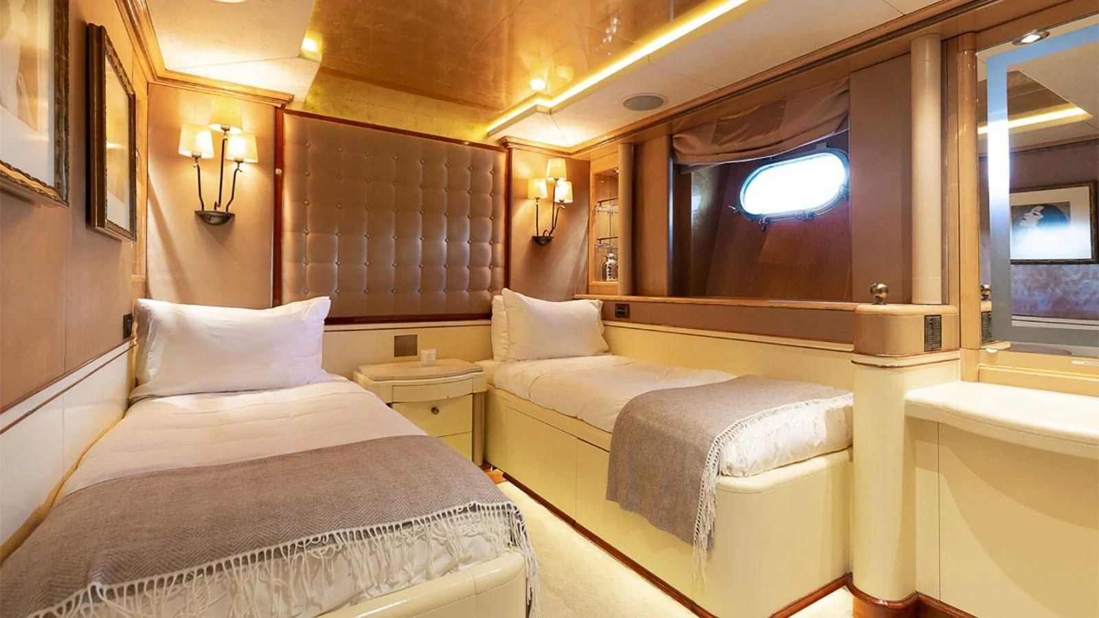 a room with two beds aboard IL SOLE Yacht for Sale