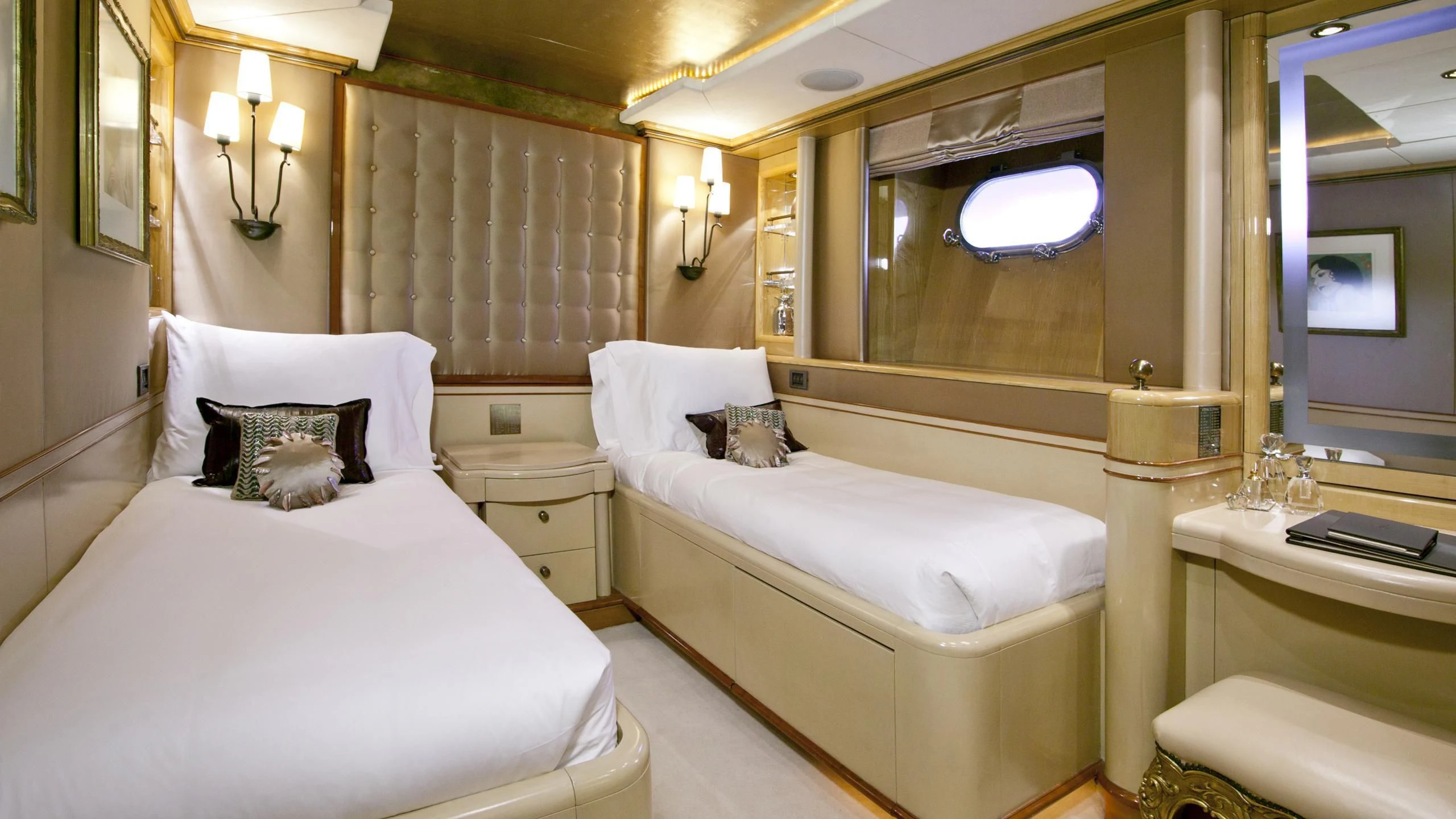 a couple of beds in a hotel room aboard IL SOLE Yacht for Sale