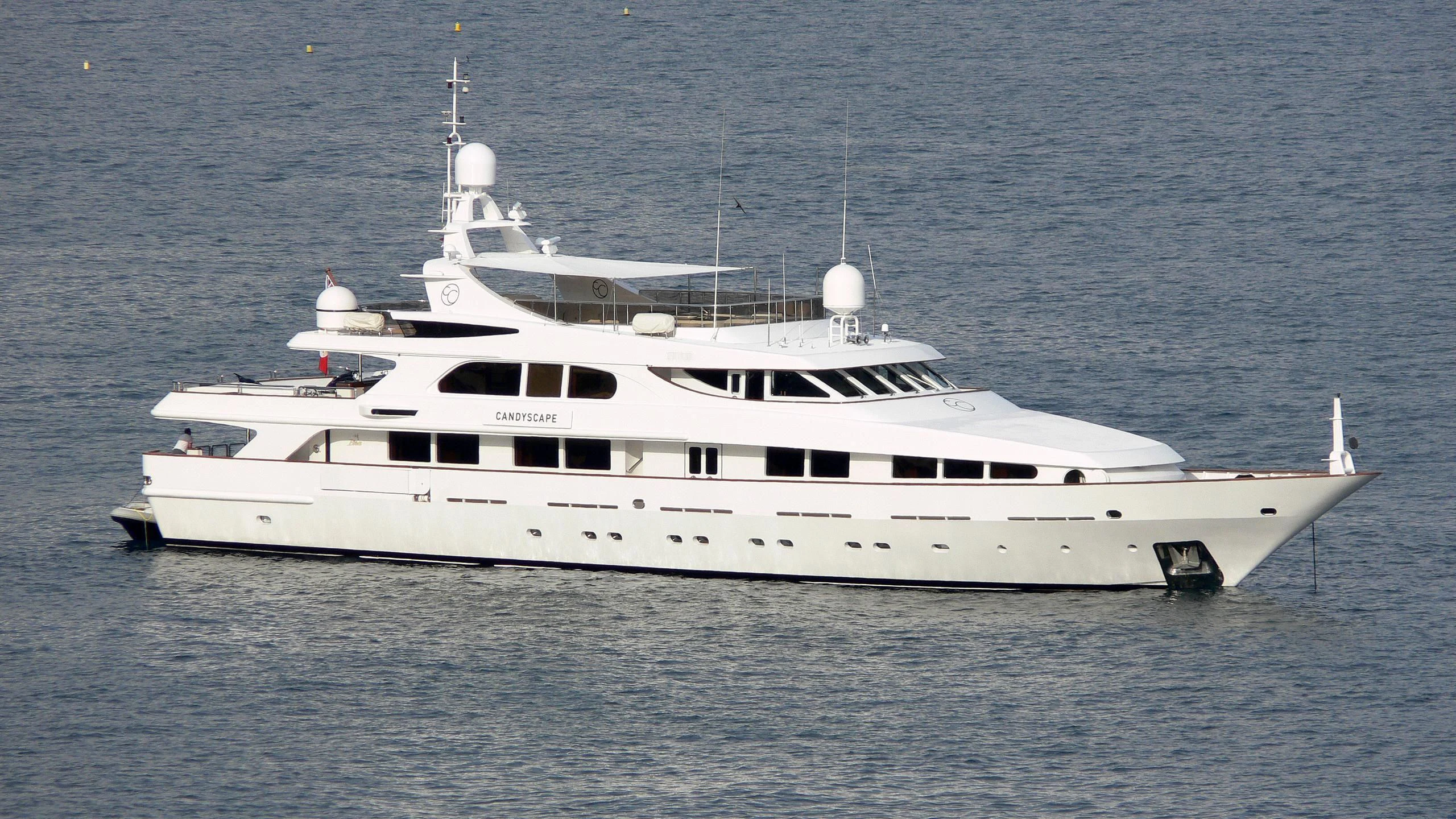 a white yacht in the water aboard IL SOLE Yacht for Sale