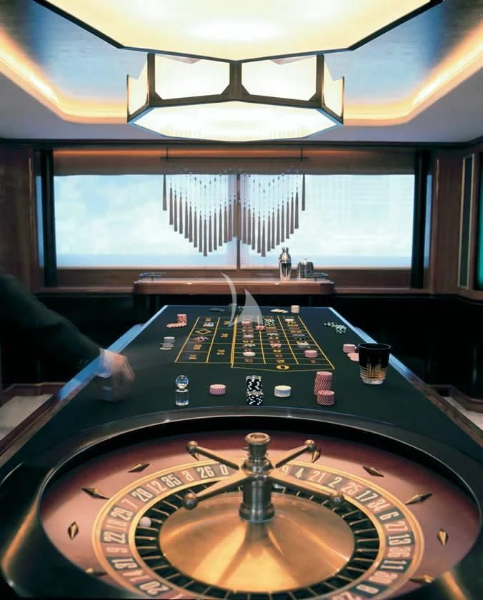 a person playing a game aboard IL SOLE Yacht for Sale