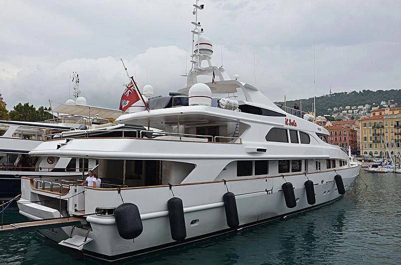 a large white boat in the water aboard IL SOLE Yacht for Sale