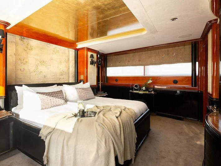 a bed in a room aboard IL SOLE Yacht for Sale