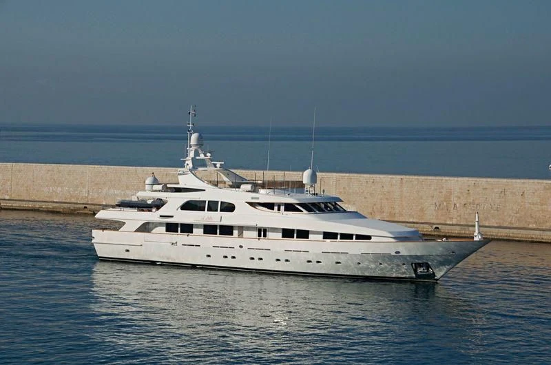 a white yacht in the water aboard IL SOLE Yacht for Sale