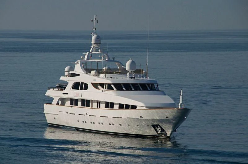 a white yacht in the water aboard IL SOLE Yacht for Sale
