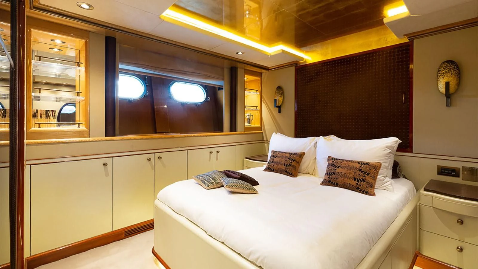 a bedroom with a bed and a tv aboard IL SOLE Yacht for Sale