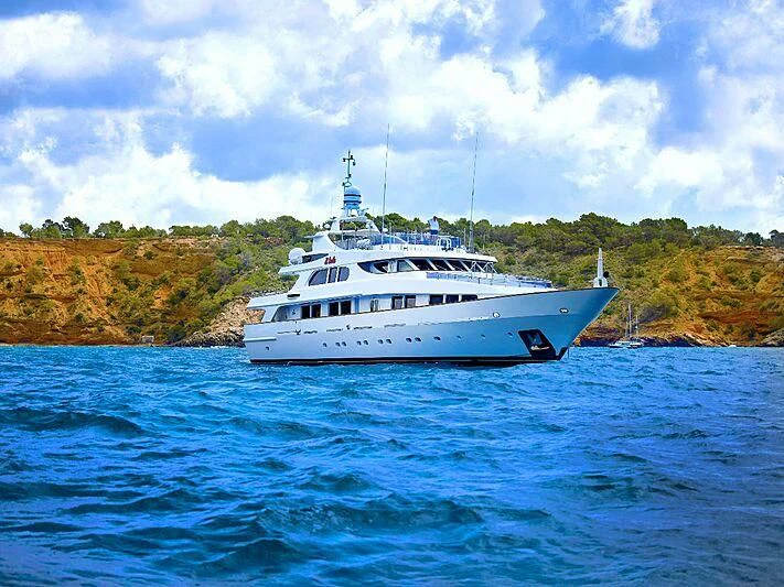 a white boat in the water aboard IL SOLE Yacht for Sale