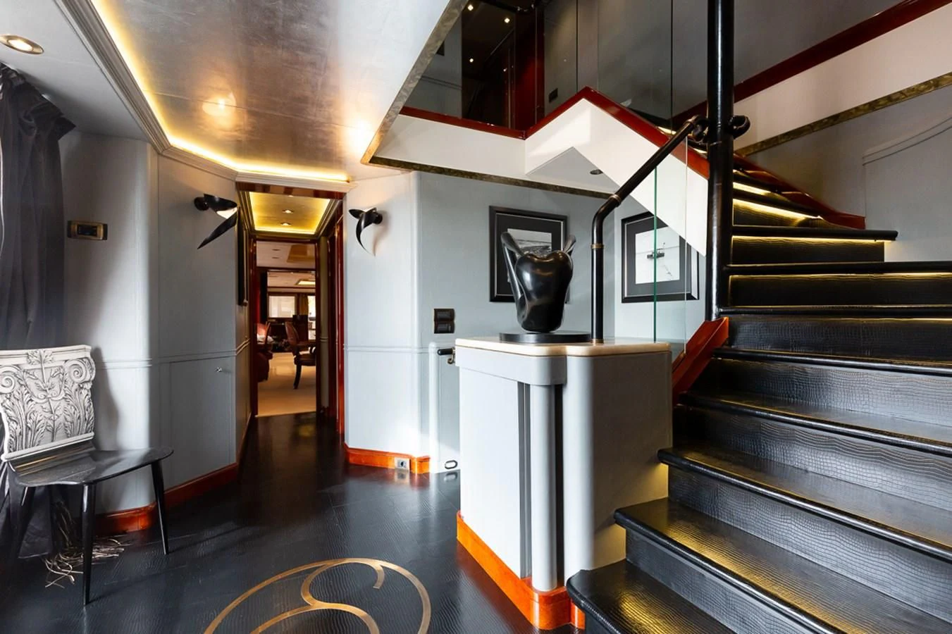 a room with a table and chairs aboard IL SOLE Yacht for Sale