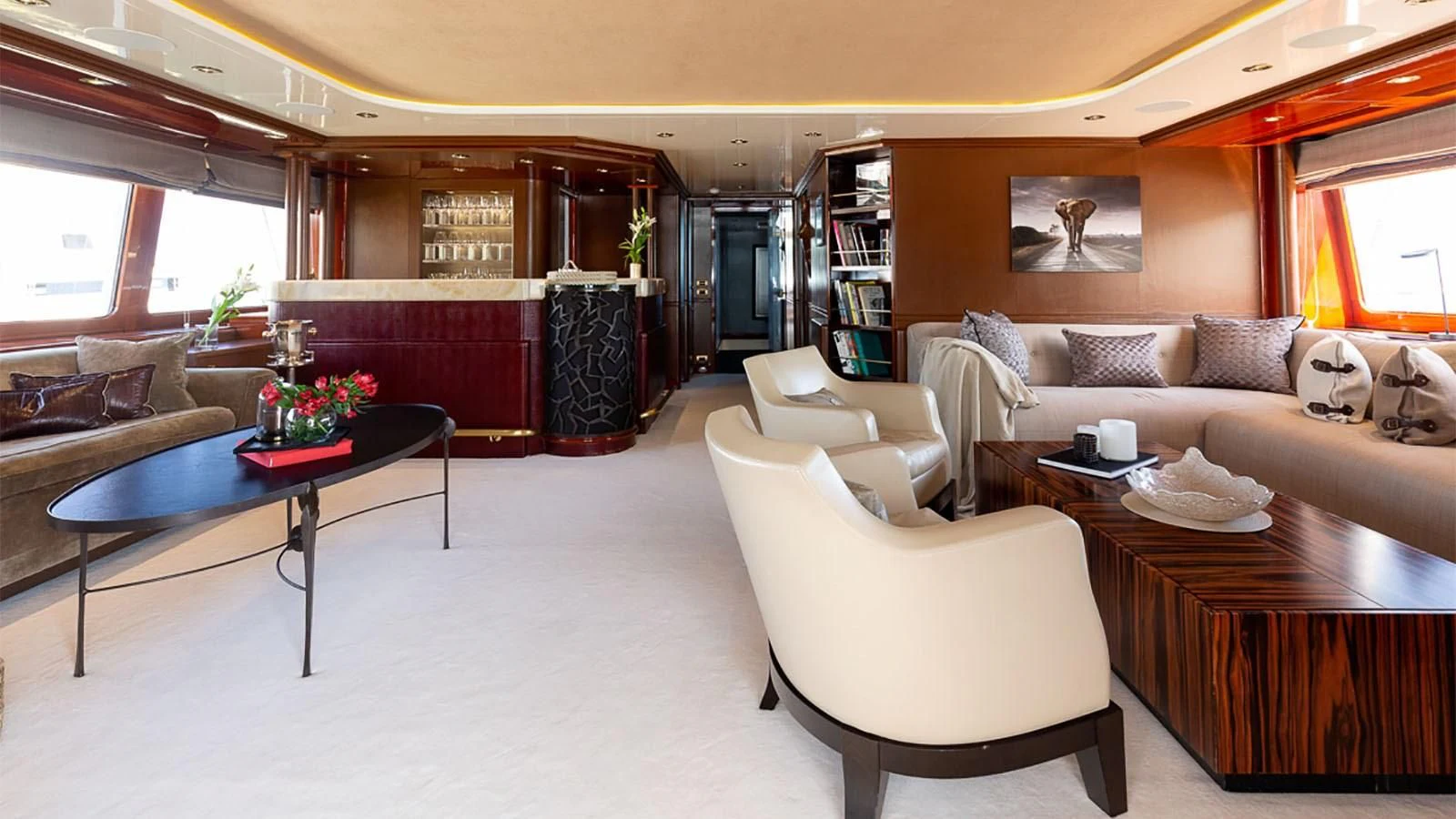 a living room with a couch and a coffee table aboard IL SOLE Yacht for Sale