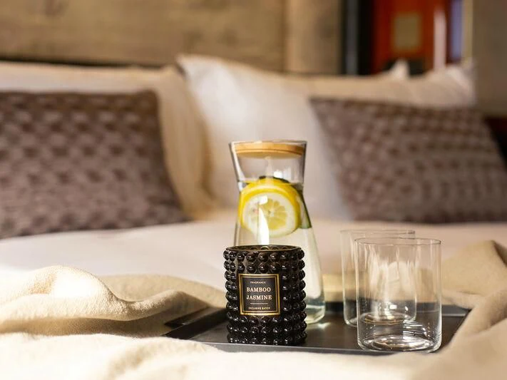 a bottle of alcohol on a table aboard IL SOLE Yacht for Sale