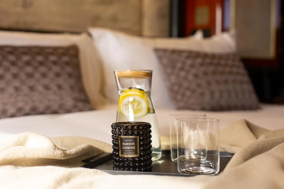 a glass of beer on a table aboard IL SOLE Yacht for Sale
