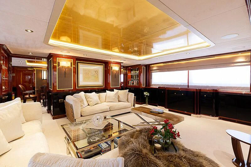 a living room with a large window aboard IL SOLE Yacht for Sale